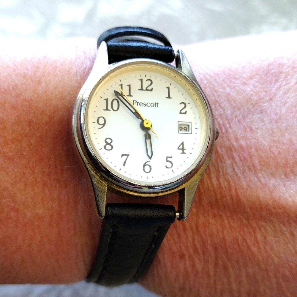 Pescott Genuine leather band watch.